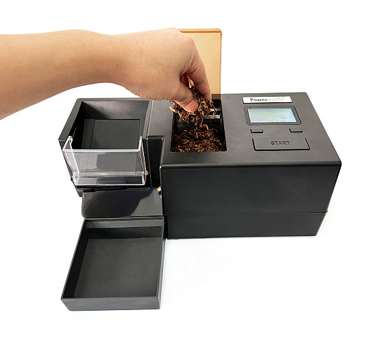 De volume tabak wordt geladen in Powermatic 5 automatische hulzenvuller